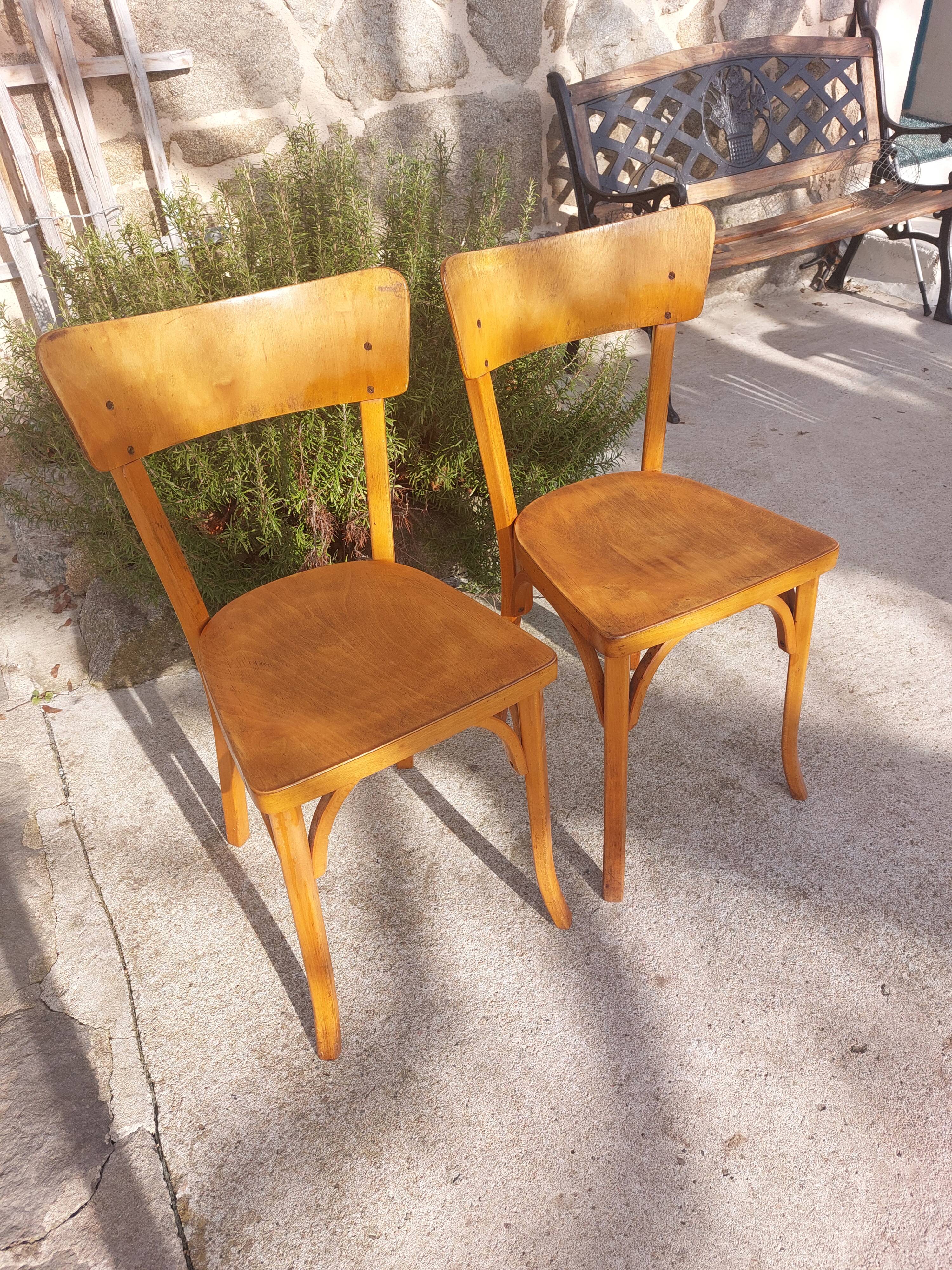 pair of Baumann bistro chairs