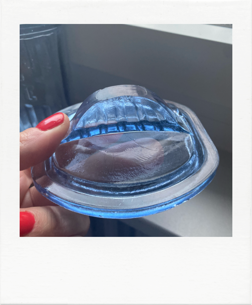 Old coffee pot in blue glass