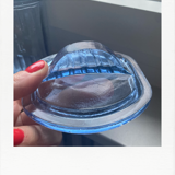 Old coffee pot in blue glass