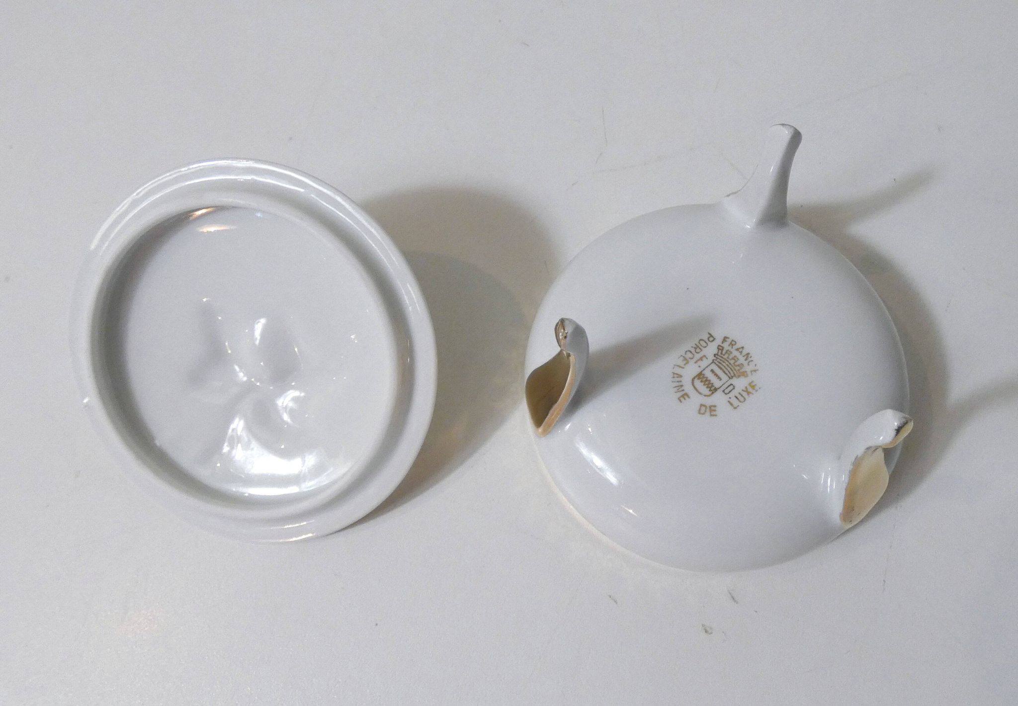 antique sweet jar in white and gold porcelain