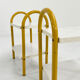 Pair of yellow tubular bedside tables, 1980