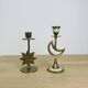 Pair of mother-of-pearl brass candlesticks with moon and sun