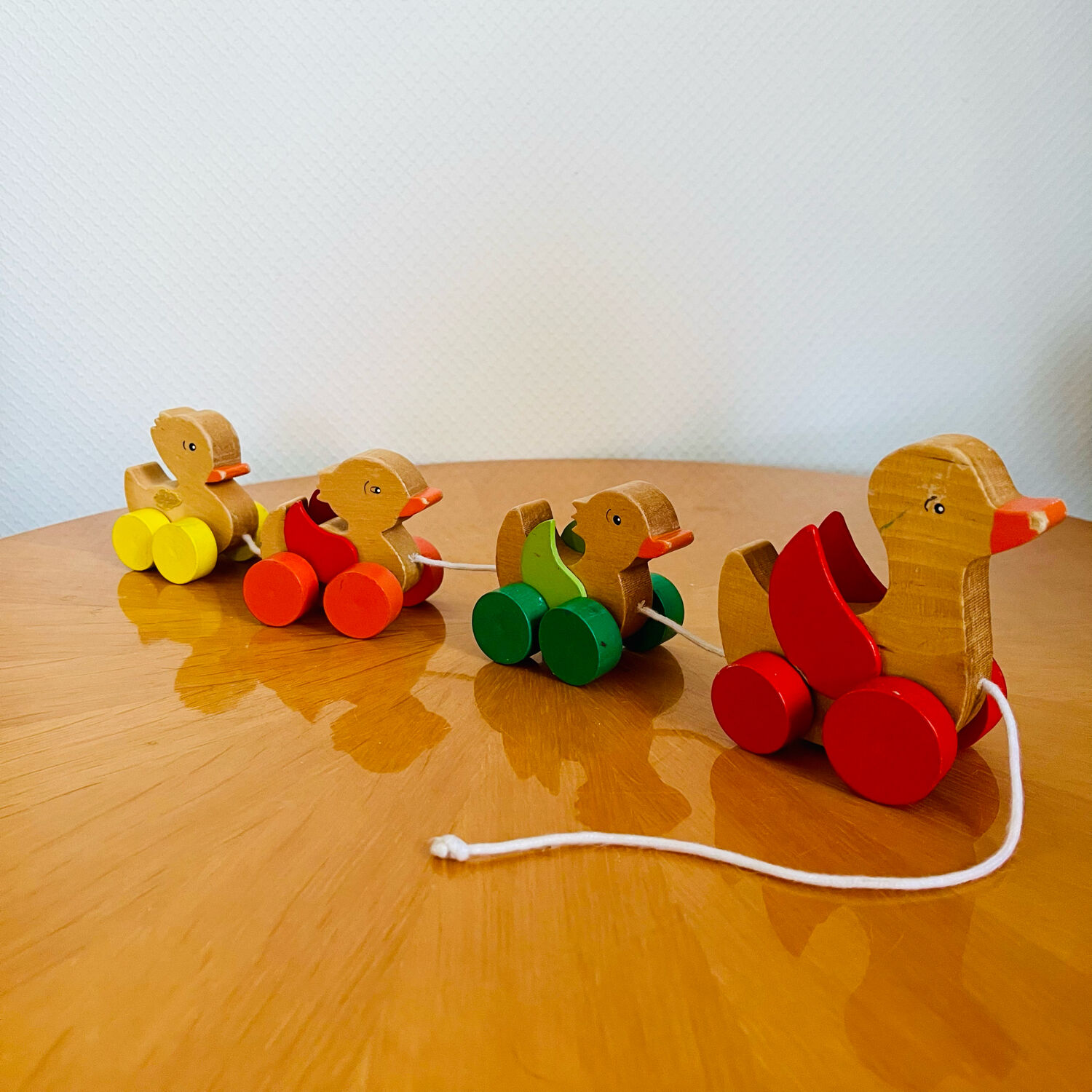 Old vintage wooden duck toy to pull
