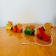 Old vintage wooden duck toy to pull