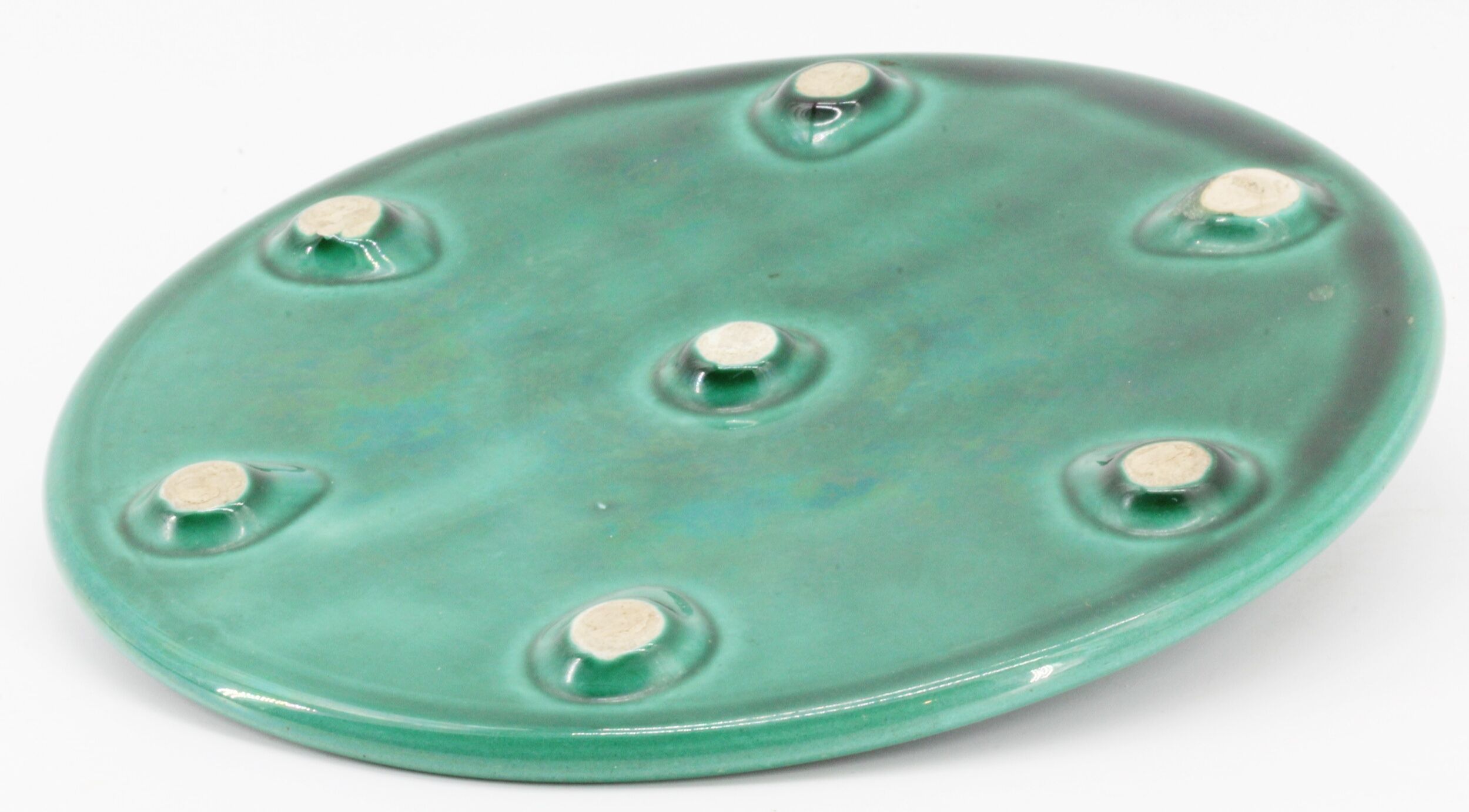Under the plate and under ceramic bottles