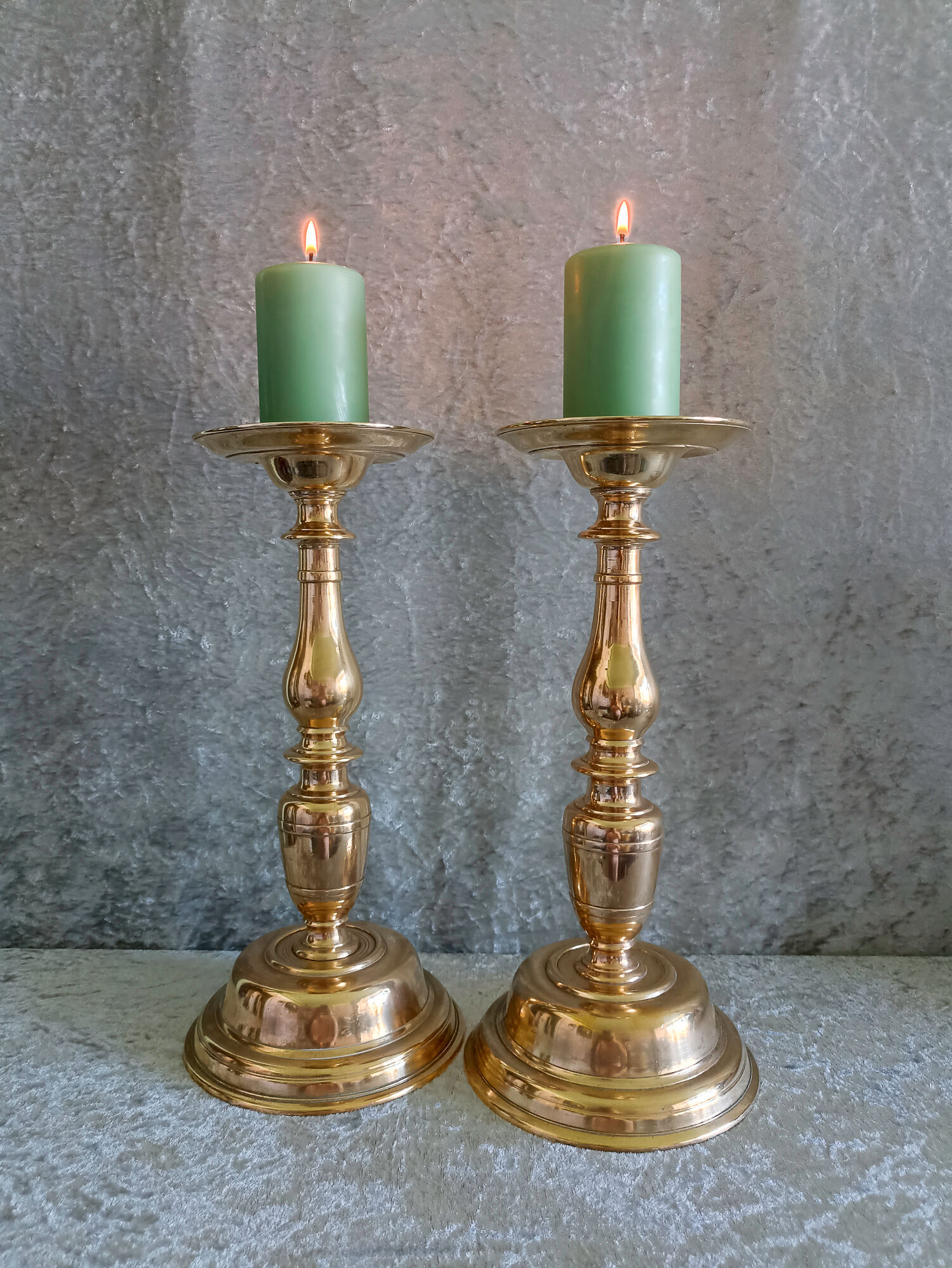 Pair of very large gilded bronze candlesticks