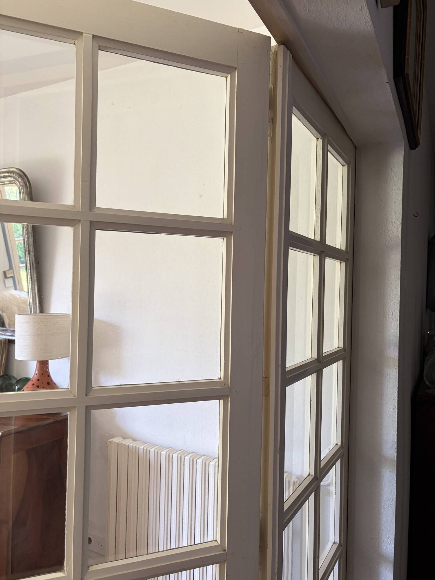 Triptych glass door with three panels featuring small panes. Vintage.