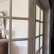 Triptych glass door with three panels featuring small panes. Vintage.