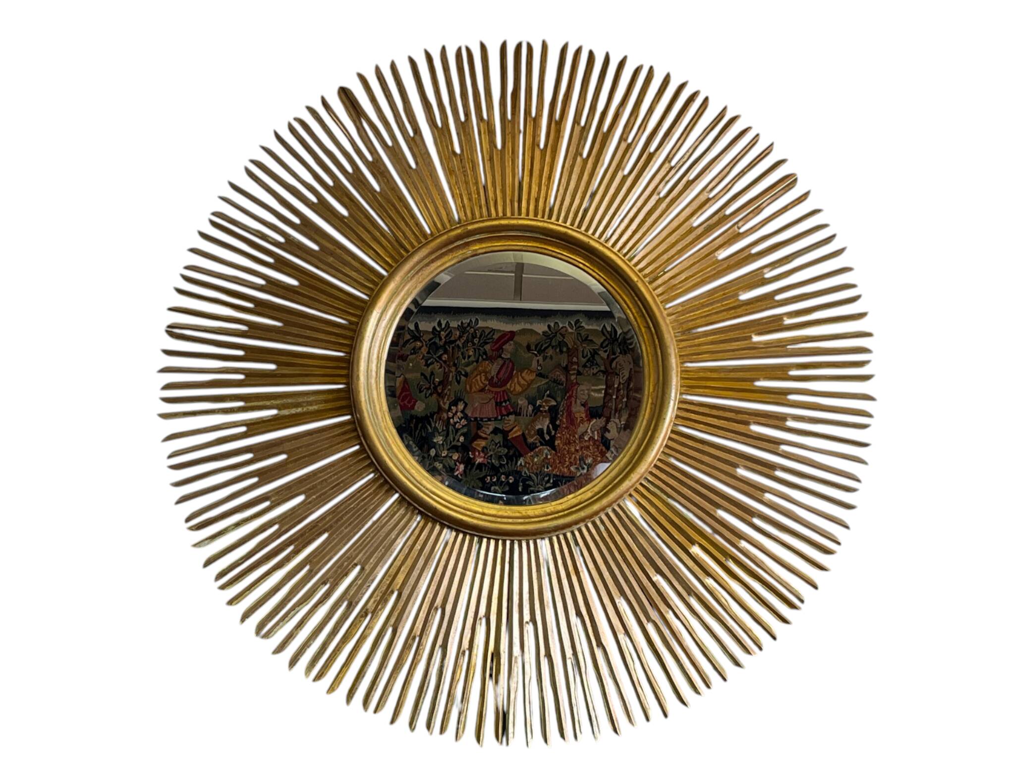 Large sunburst mirror with beveled glass and gilded wood from around 2010.