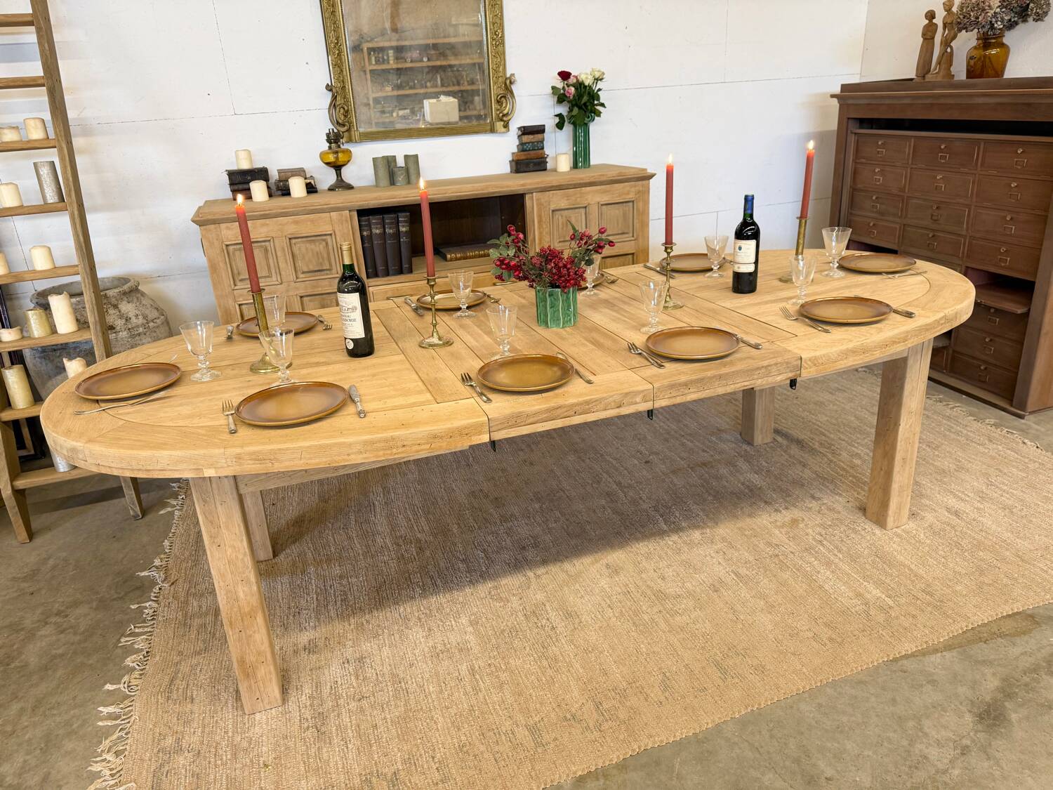 Oval farmhouse table in solid oak with extensions.