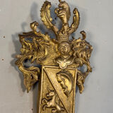 Heraldic cartouche in carved and gilded wood, Belgium, 19th century