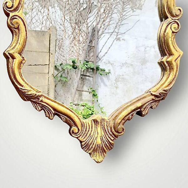 Miroir style Rocaille en plâtre doré, vers 1950
