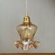 Suspension tulipe vintage en verre ambré