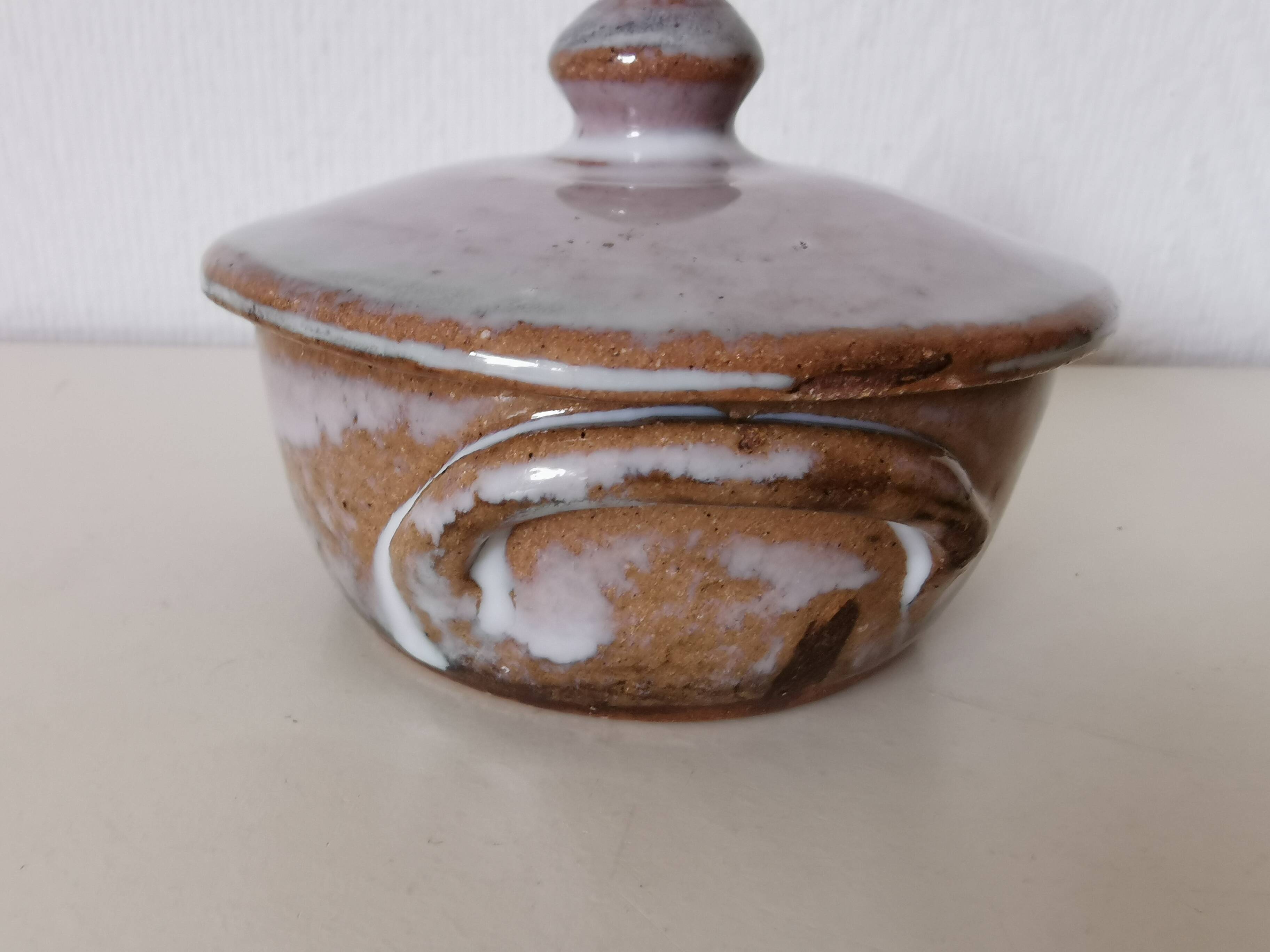 brown and white glazed stoneware sugar bowl