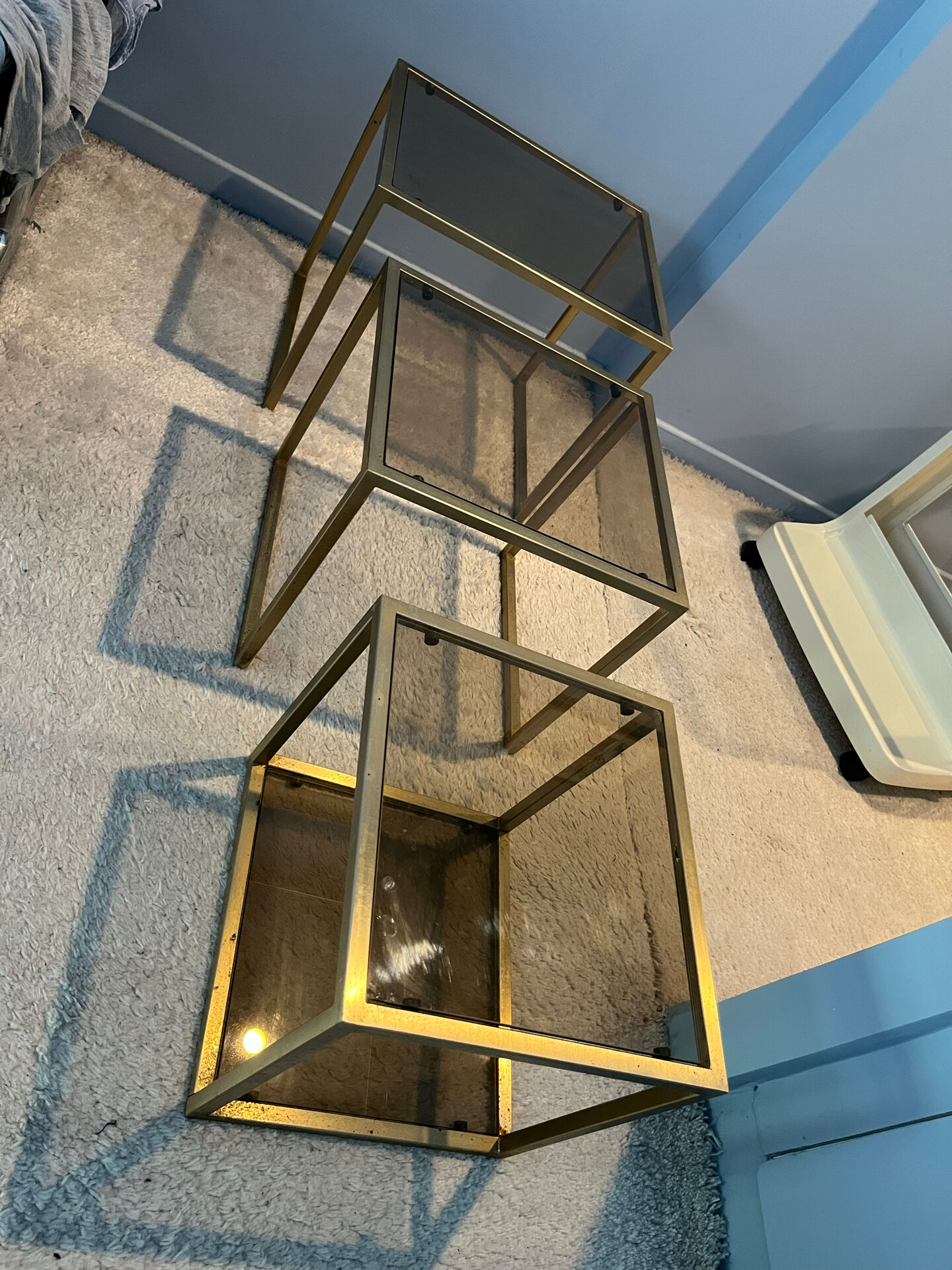 3 nesting tables in the style of Jansen.