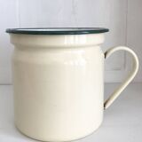 Old milk jug in enameled sheet metal