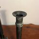 Pair of removable patinated brass candlesticks
