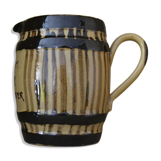 Striped pitcher and inscription