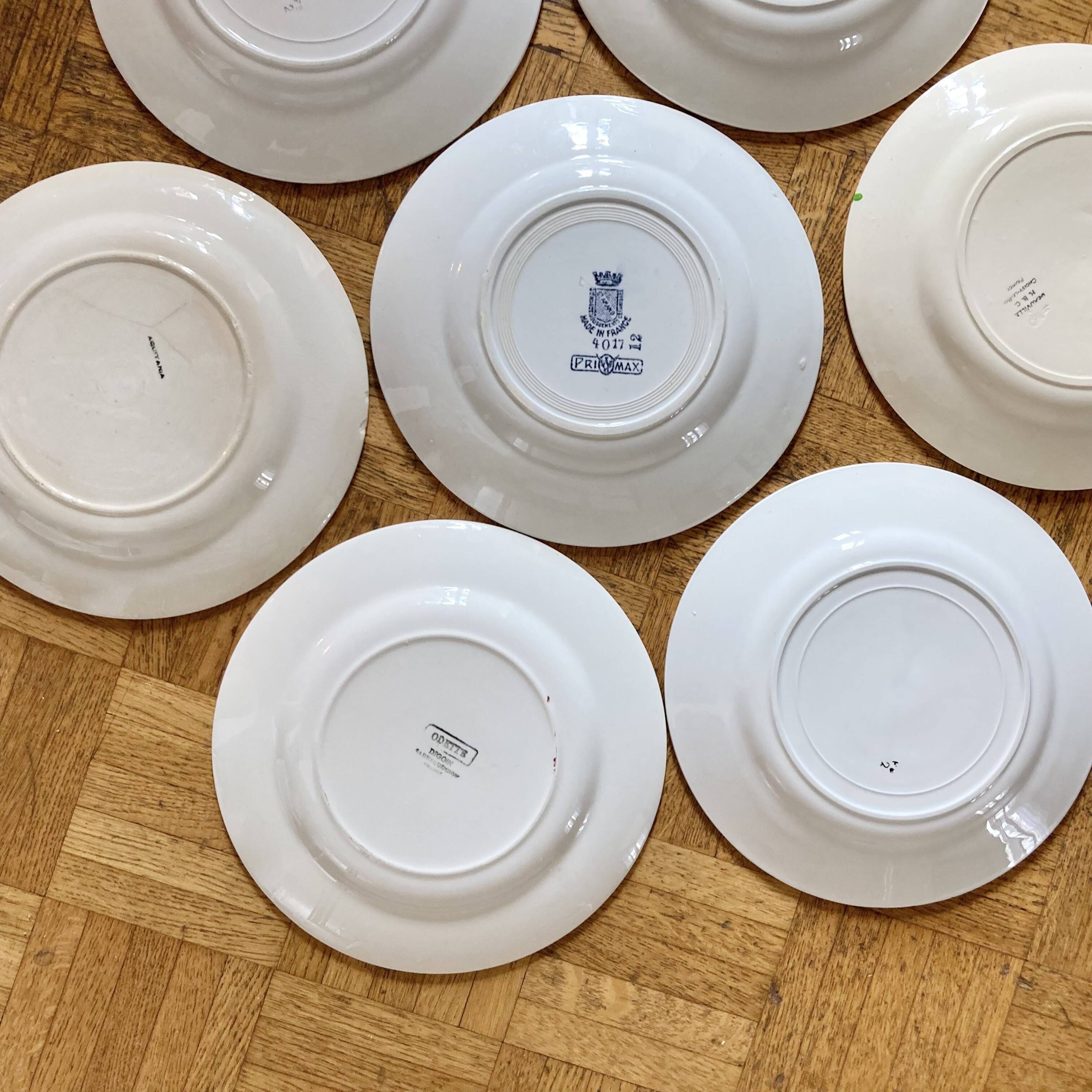 8 mismatched old plates