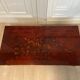 Table basse laque rouge et or 1970s