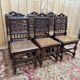 6 High Era chairs in carved solid oak and rattan caning.