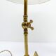 Articulated tripod lamp base in brass, Arts & Crafts style, in the manner of.