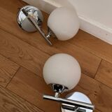 Pair of metal and opaline wall lights