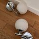 Pair of metal and opaline wall lights