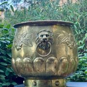 Large brass lion planter with a hallmark from the 19th century.