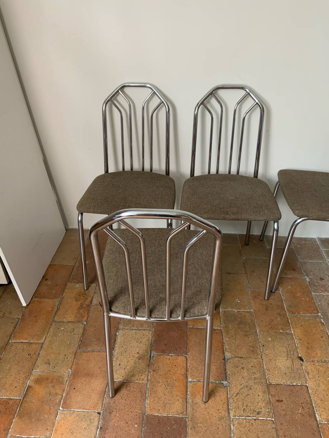 6 chrome metal chairs