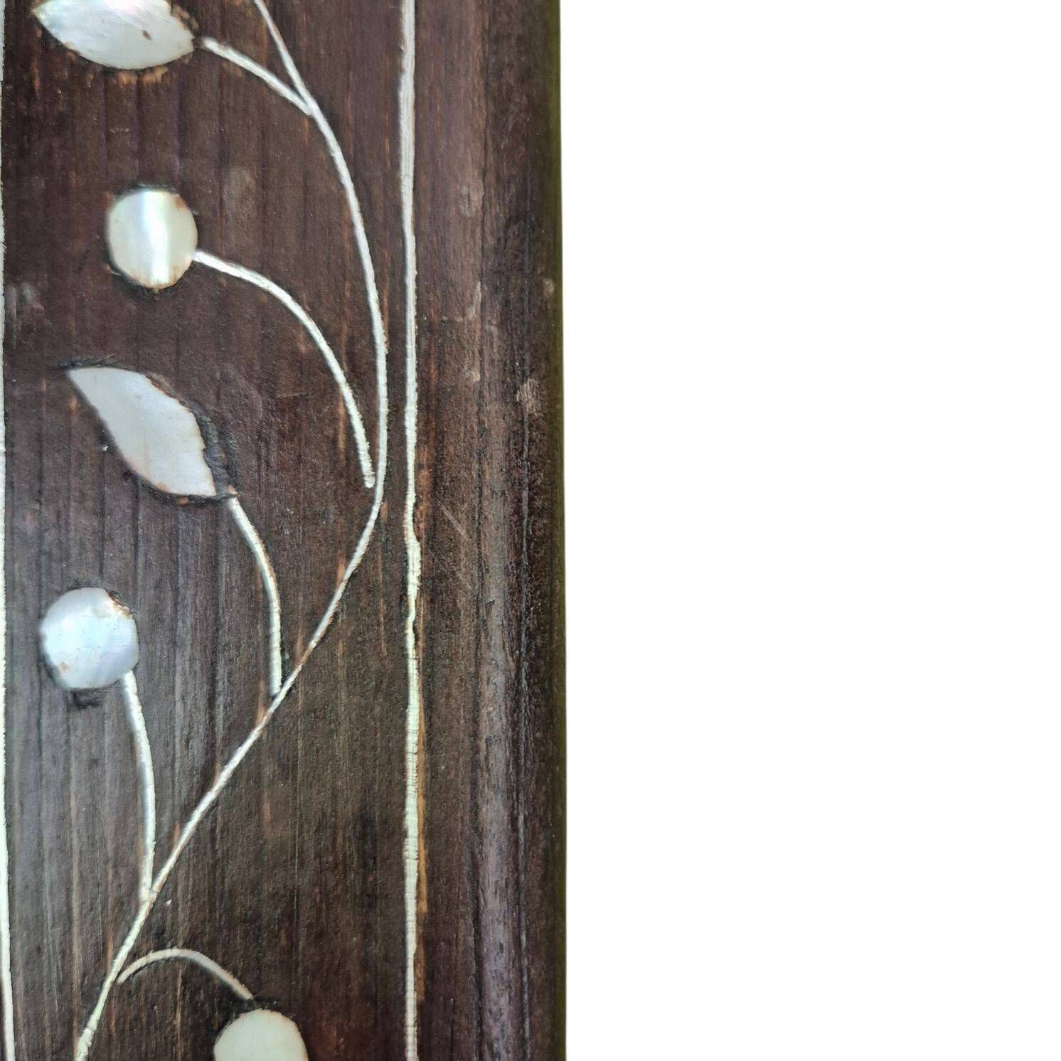 Antique Moroccan mirror in wood and mother-of-pearl.