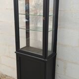 Old two-door shop showcase with black patina