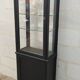Old two-door shop showcase with black patina