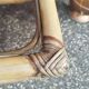 Small coffee or bedside table in rattan and vintage smoked glass