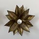 Pair of vintage patinated brass wall lights with floral motif, France, 1960.