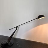 Fase lamp with movable arm