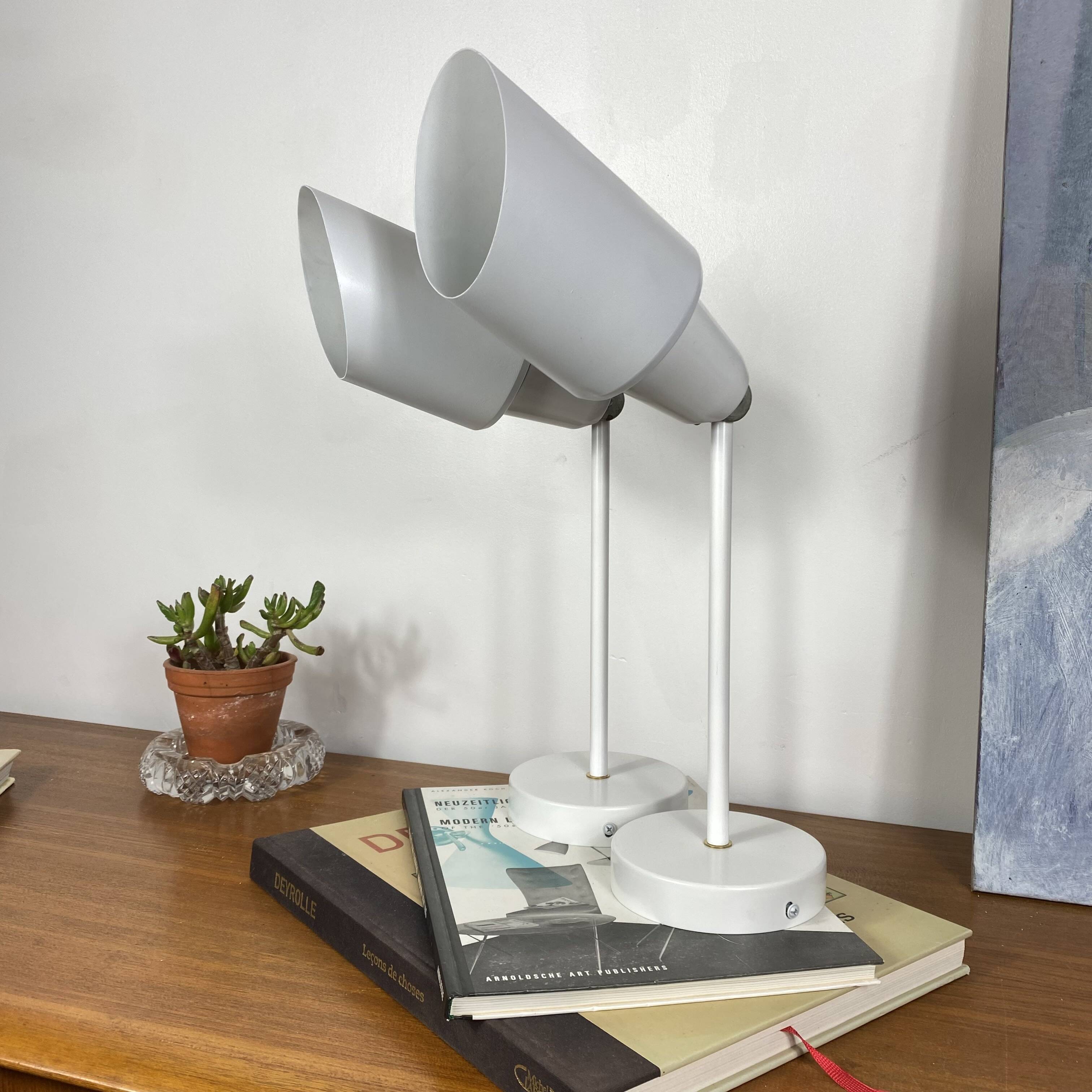 Pair of old industrial adjustable wall sconces in white metal.