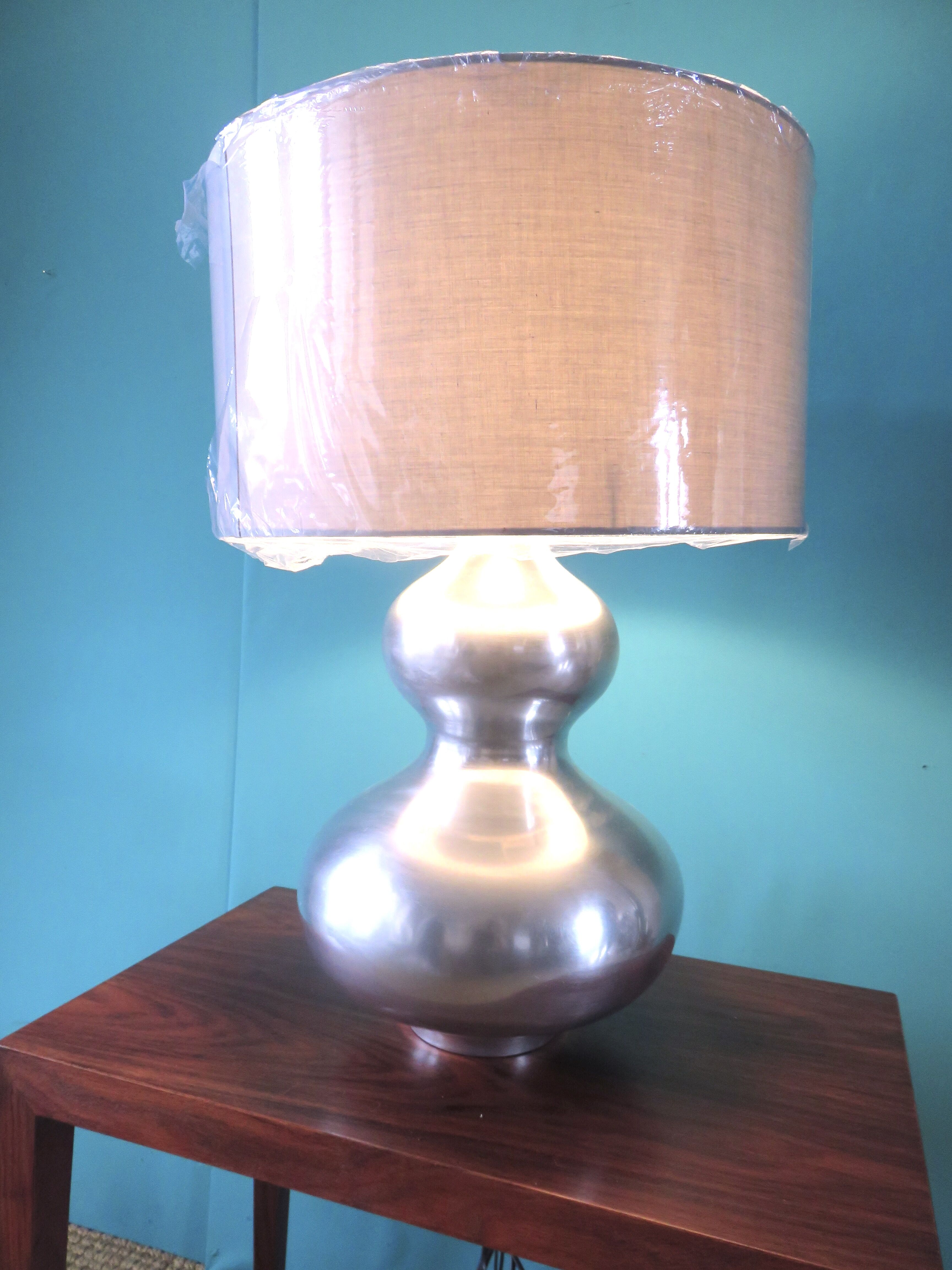 Lampe en acier brossé. France 1970