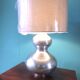 Lampe en acier brossé. France 1970
