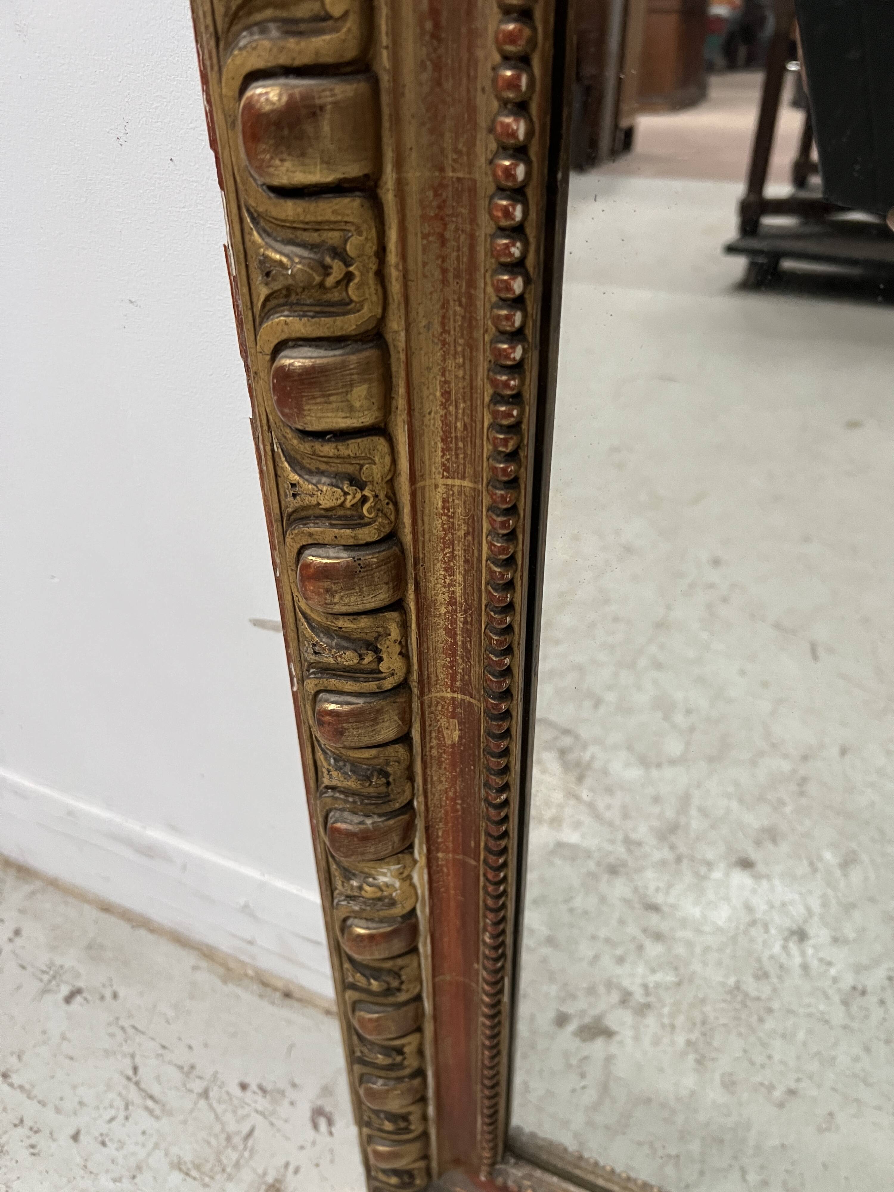 Louis Philippe gadrooned mirror in wood and gilt stucco, 19th century