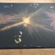 Glass coffee table by Lasco eglomisé and iron/iron gold. signed