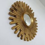 Ancien miroir soleil doré œil de sorcière bombé en résine, années 70