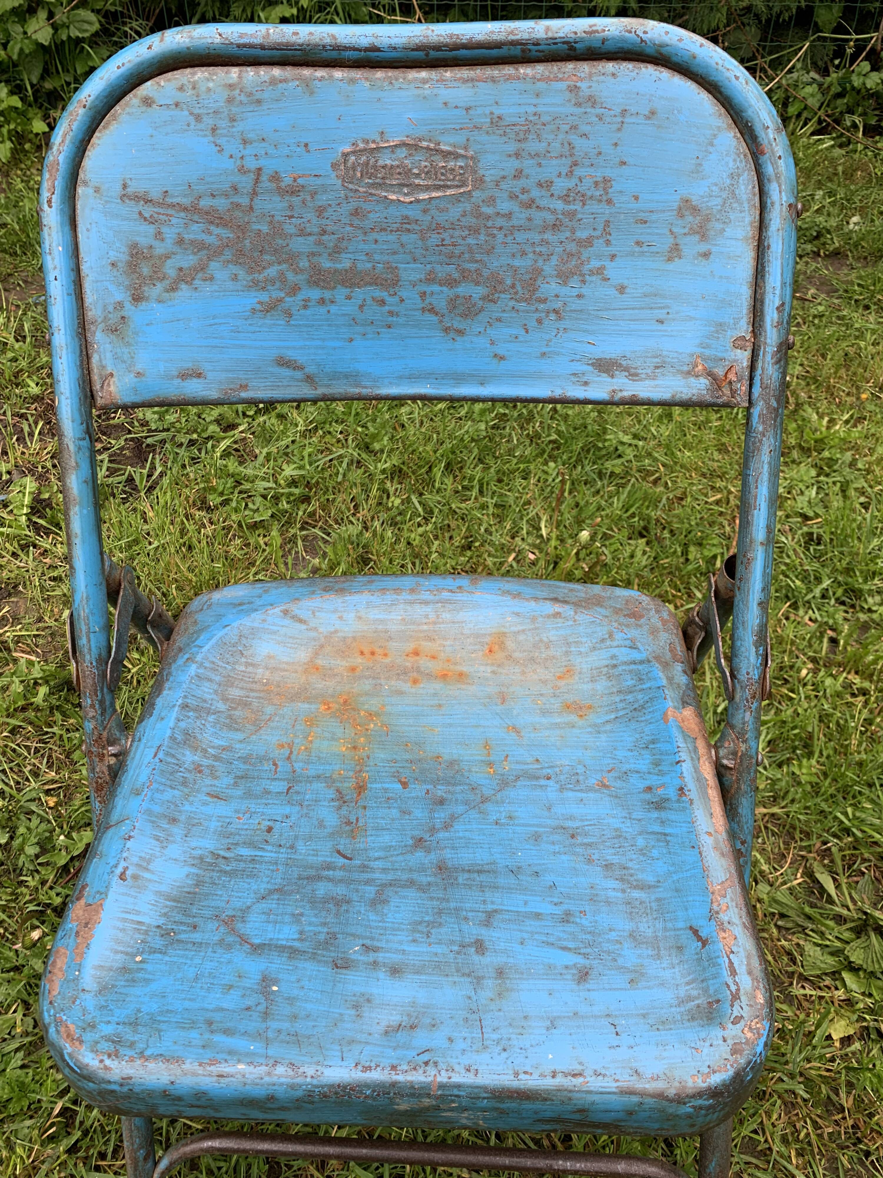 Folding metal chairs