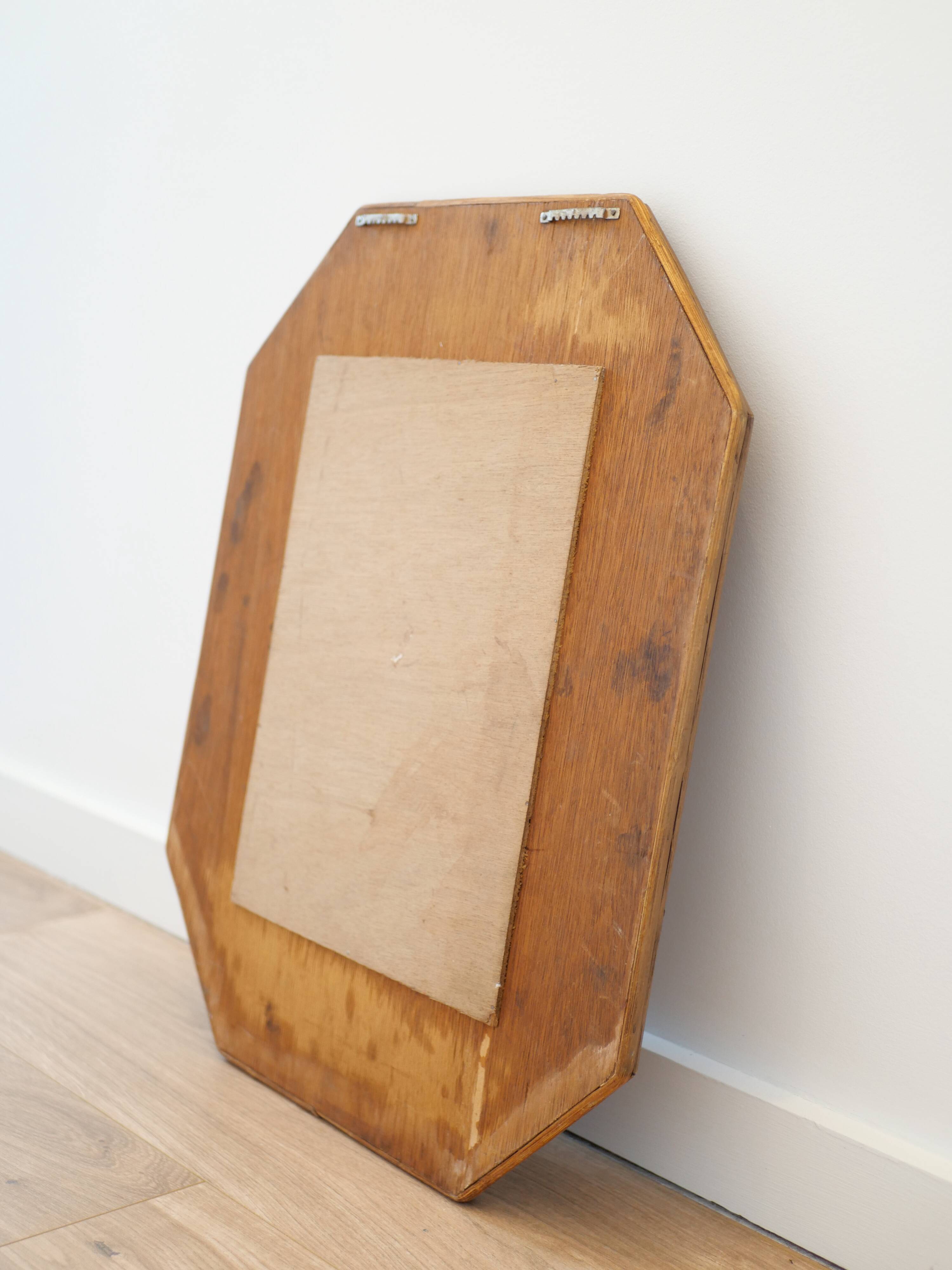 Octagonal mirror in woven bamboo