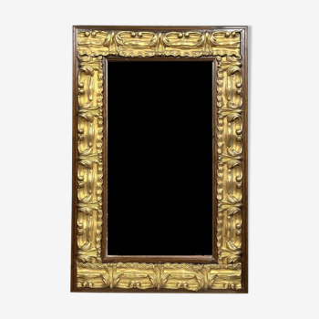 Miroir époque Napoléon III en bois et cuivre repoussé vers 1880