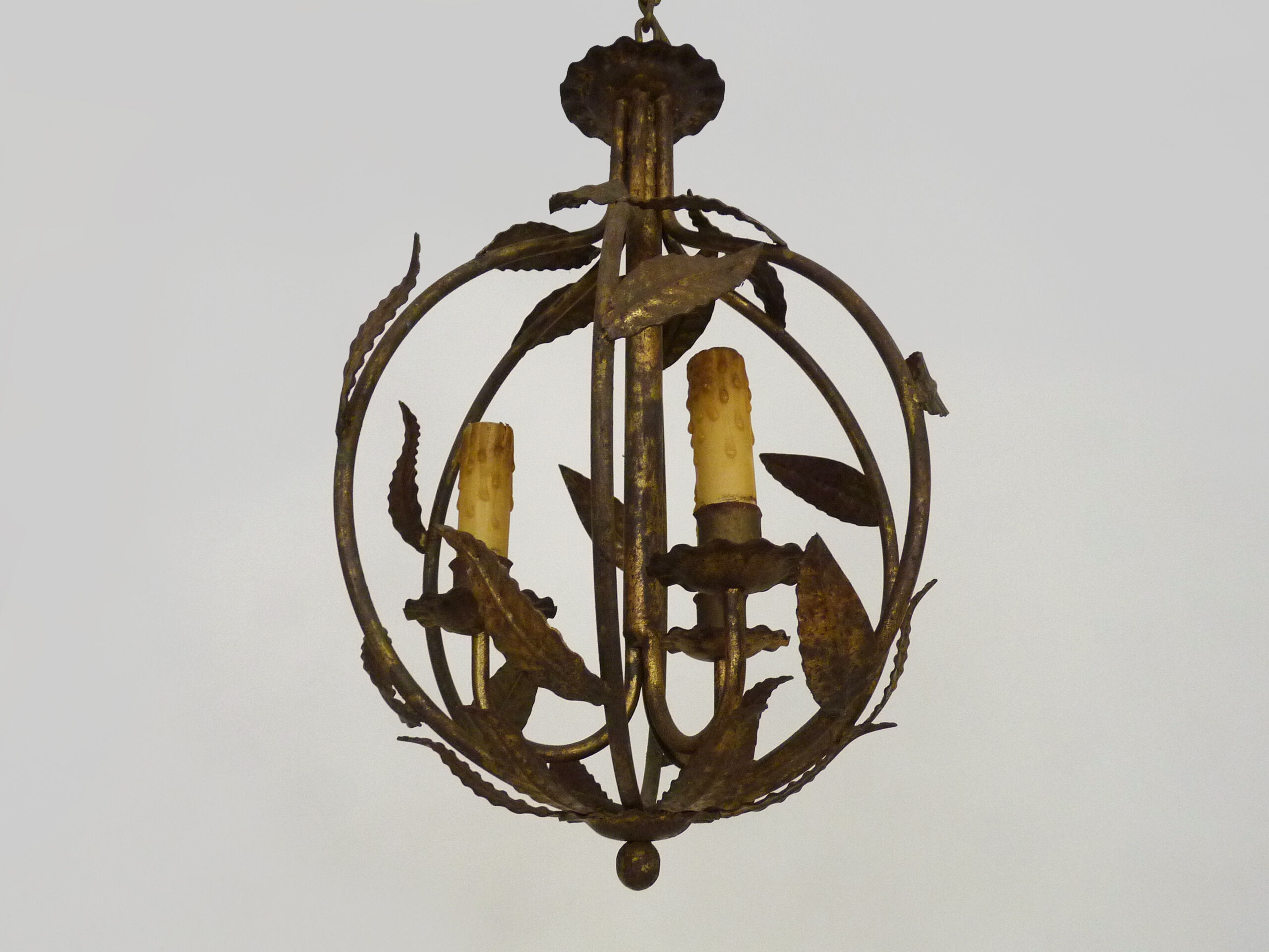 Vintage cage chandelier in aged golden metal and foliage, antique lighting, 3-burner chandelier. Year 60