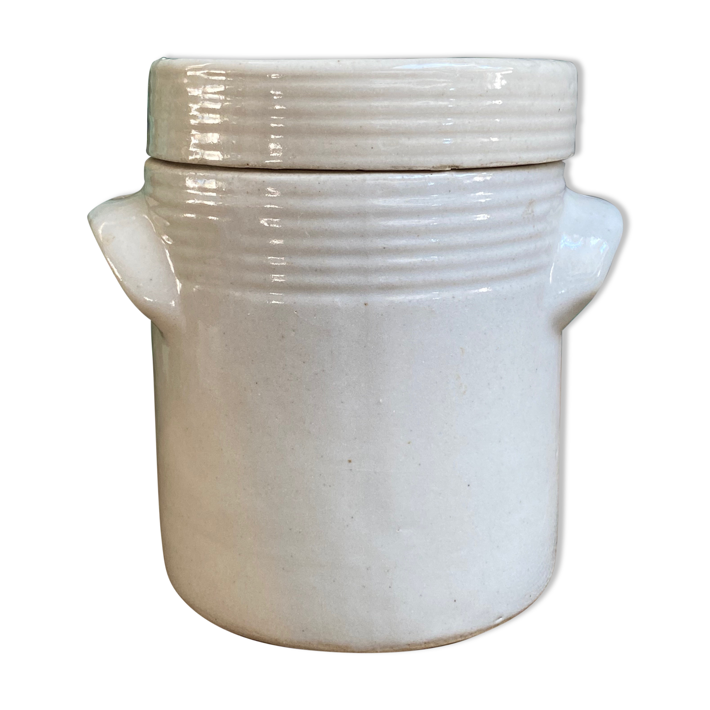 White pot in glazed earth