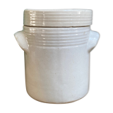 White pot in glazed earth
