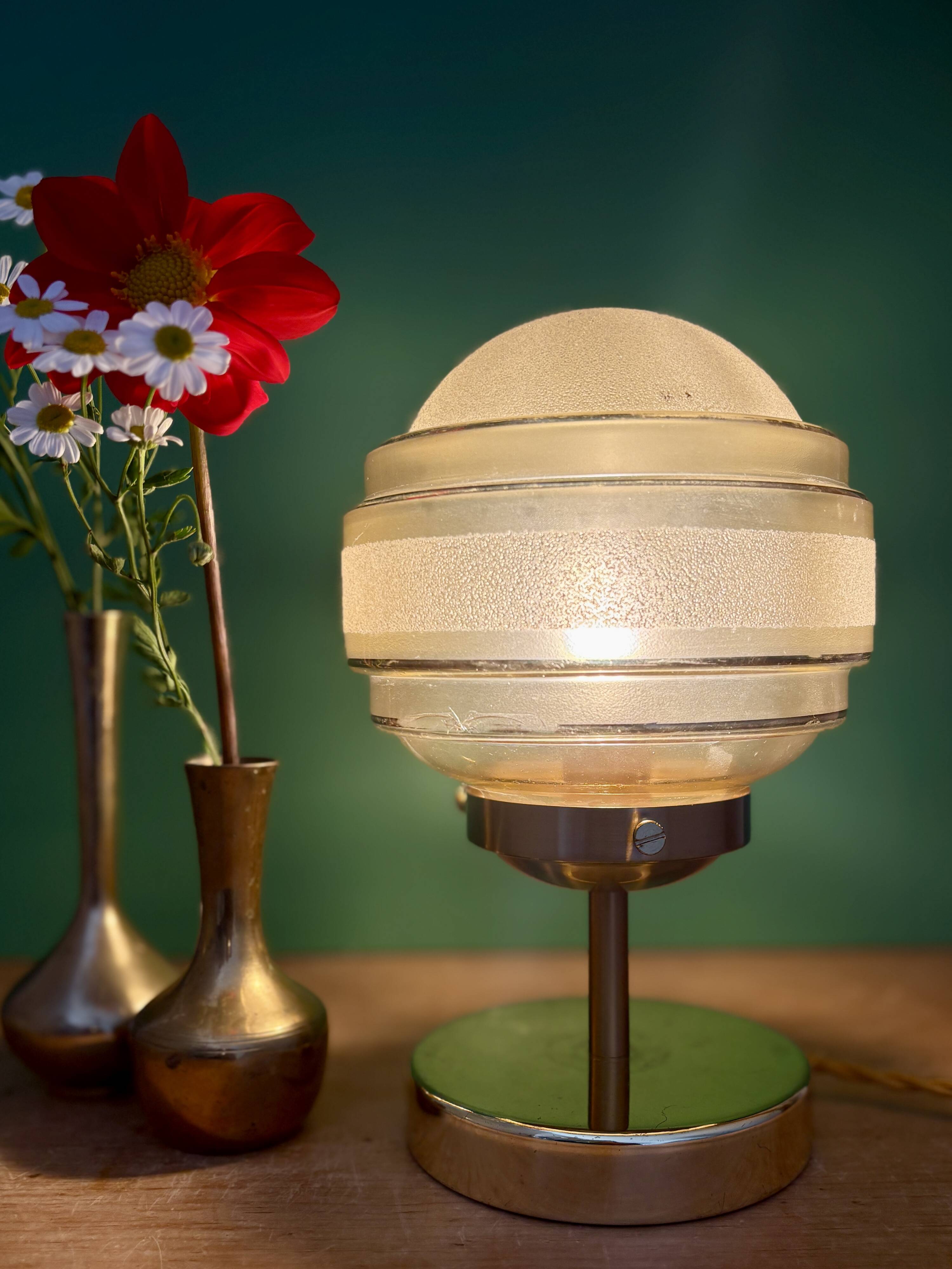 Vintage globe table lamp in frosted yellow and gold glass.