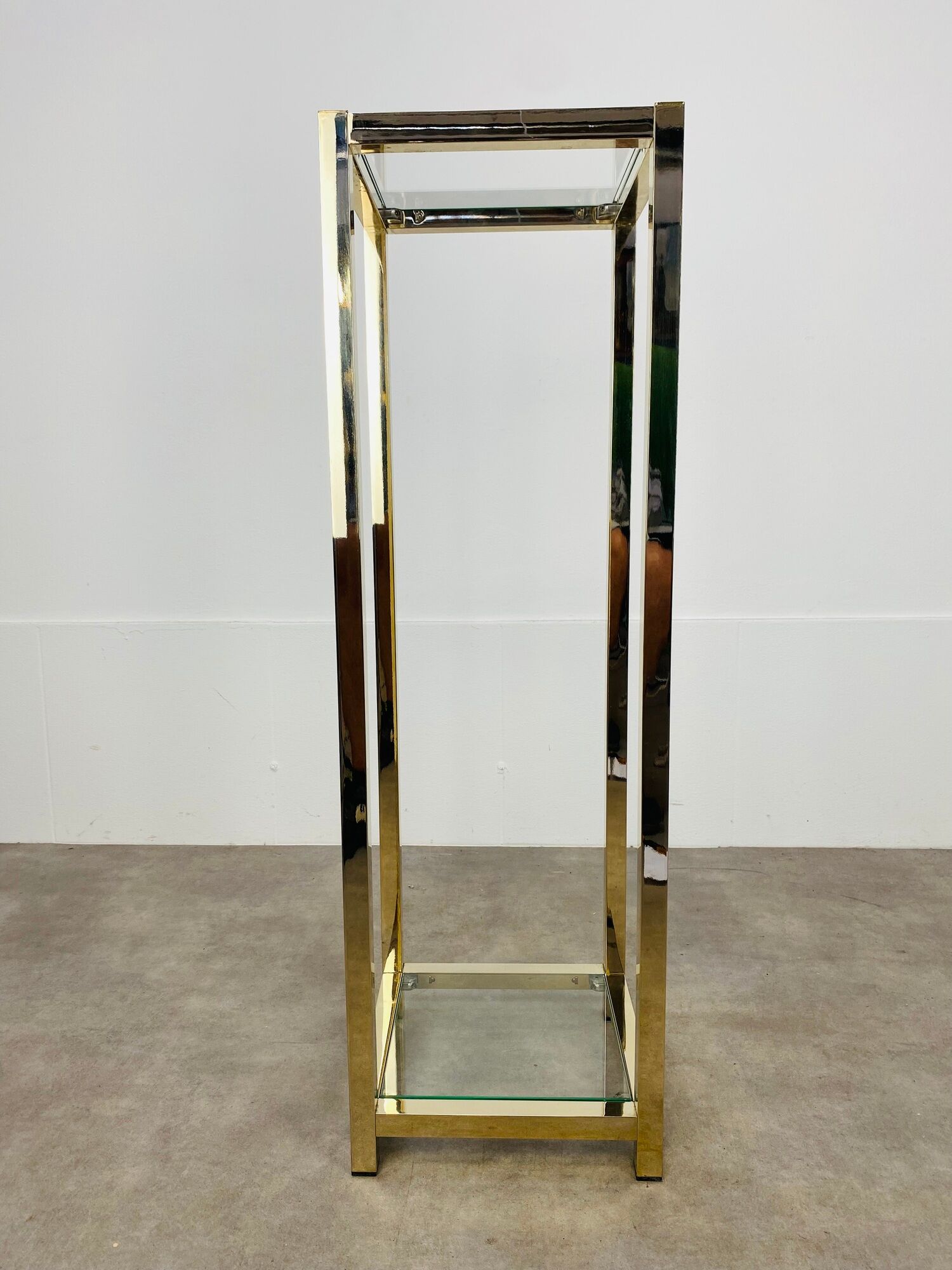 Gilded metal fifth wheel column and Hollywood Regency style glass 70s